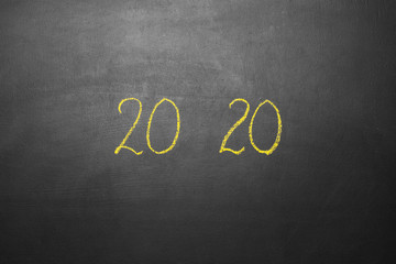Obraz premium The inscription 2020 on a chalkboard