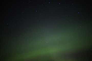 Northern lights and bright stars in the night