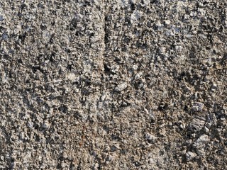 Simple stone texture close up, abstract background.