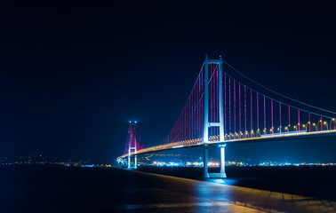 Fototapeta na wymiar Osmangazi Bridge (Izmit Bay Bridge). IZMIT, KOCAELI, TURKEY. Longest bridge in Turkey and the fourth-longest suspension bridge in the world by the length of its central span..