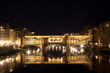 Fototapeta na wymiar Beautiful view of the Ponte Vecchio bridge across the Arno River in Florence, Italy