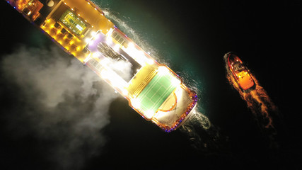 Aerial night shot of Cruise liner ready to depard from Mediterranean port