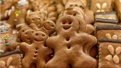 Delicious gingerbread men cookies. Funny and happy festive table for Christmas and winter holidays. Shop of sweets