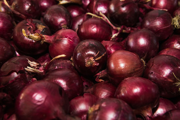 Fresh purple onions as a background