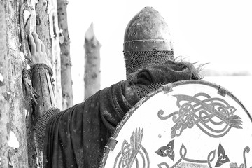 Defender the young warrior in armor