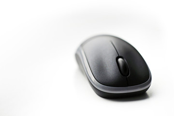 Computer wireless mouse on the table close up. Cumputer. IT. Technology