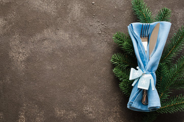 Christmas table setting. Winter background for writing the Christmas or New Year Menu.