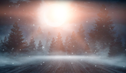 Dark abstract winter forest background. Wooden floor, snow, fog. Dark night background in the...