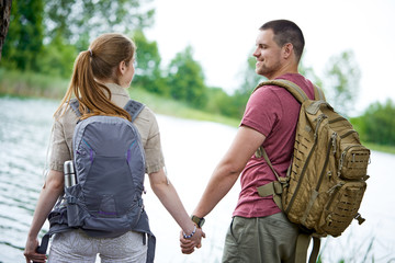 Fototapeta premium Two travelers near lakes