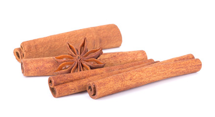 Spicy Cinnamon Sticks and Anise isolated on White background closeup macro shot