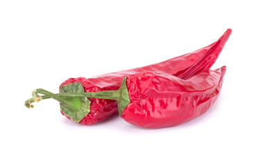 Dried red chili or chilli cayenne pepper isolated on white background cutout closeup
