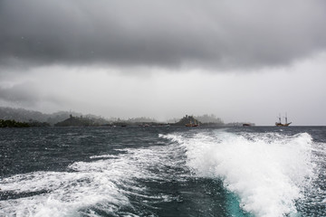 Obraz premium View to Waisai city from the sea in Raja Ampat, Indonesia