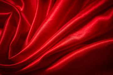 Luxury red satin smooth fabric background for celebration, ceremony, event invitation card or advertising poster - obrazy, fototapety, plakaty