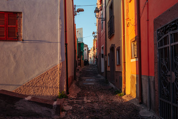 BOSA, ITALY / OCTOBER 2019: Life in the colorful fishermen's village in the north iof Sardinia