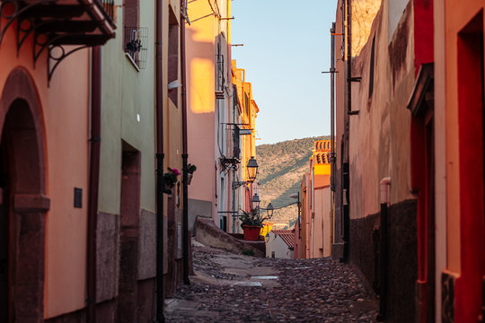 BOSA, ITALY / OCTOBER 2019: Life in the colorful fishermen's village in the north iof Sardinia
