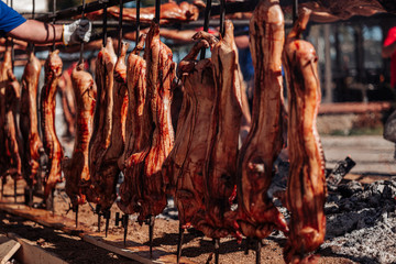 ORGOSOLO, SARDINIA /OCTOBER 2019: The old tradition of cooking the Porceddu Sardo, a young pig.
