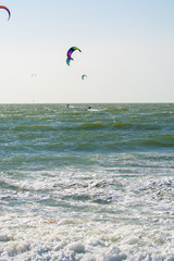 Water sport event, kite surfers race in North Sea near Renesse, Zeeland, Netherlands