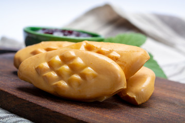 Oscypek or Oszczypek smoked cheese made of salted sheep milk exclusively in Tatra Mountains, Zakopane, Poland.