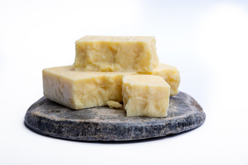 Cheddar cheese collection, block of Cheddar cheese made from cow milk