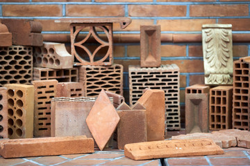 Red clay bricks and blocks for building and construction, close-up