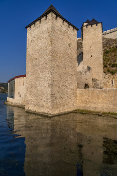 Summer afternoon view of restored medieval Golubac fortress, trdava Golubac  on the bank of the Danube in Serbia for Yugoslavia across from Romania major tourist destination