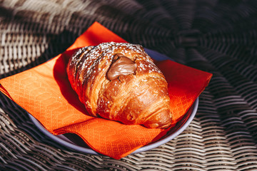 A delicious chocolate croissant for the morning breakfast