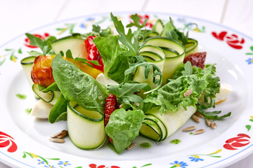 zucchini rolls with fresh salad