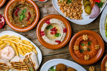 assorted Turkish dishes, hummus, muhamara, mutabal, falafel, shawarma