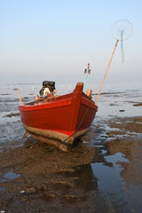 Fototapeta premium fishing boat on the beach