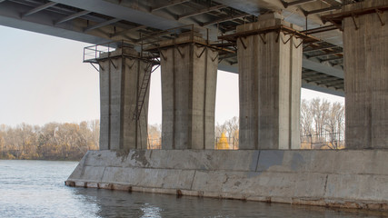 Concrete bridge and river.