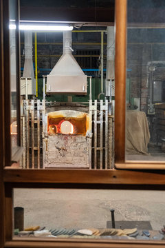 Murano factory. Murano Italy Glass Blowing Furnace, Kiln. Picture from glass blower factory , Glassworks glass manufacturing process. Traditional Italian craftsmanship concept. Venice, Italy