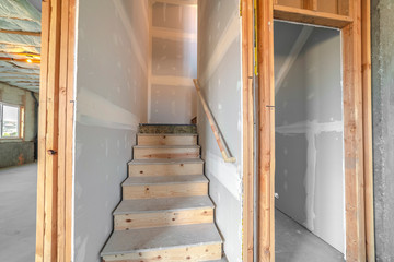 Under construction wooden stairs in a basement