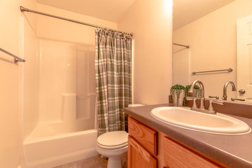 Interior of a modern bathroom with brown decor