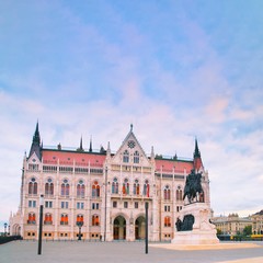 Fototapeta premium Budapest, Hungary government. Statue monument of Count Gyula Andrassy on the Parliament Square in front of Beautiful building of Hungarian Parliament in Budapest, popular Europe travel destination.