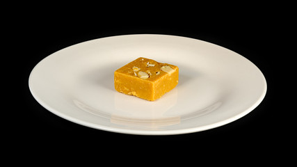 Indian dessert on a white plate