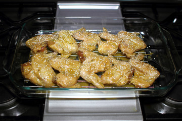 Marinated teriyaki chicken wings about to be baked in the oven.
