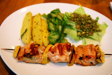 Chicken shish kebab on the dinner plate