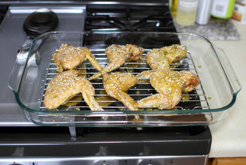 Marinated teriyaki chicken wings about to be baked in the oven.