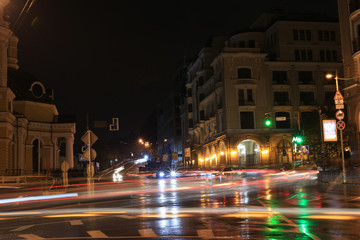 Fototapeta na wymiar Traffic on Sahaidachnoho street at Night. Kyiv (Kiev), Ukraine