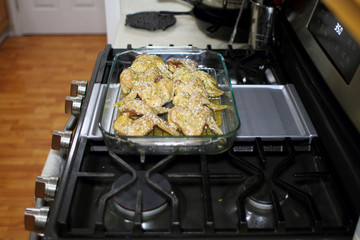 Marinated teriyaki chicken wings about to be baked in the oven.