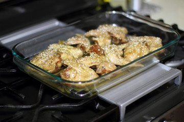 Marinated teriyaki chicken wings about to be baked in the oven.