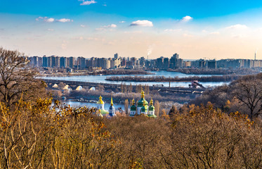 Fototapeta premium City Landscape. View of Dniper river and St. Michael's Vydubytsky Men's Monastery, Kyiv (Kiev), Ukraine