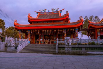 Chinese temples with lantern ornaments on the front and dragon ornaments on the top