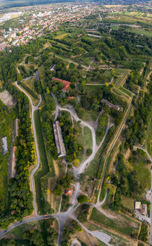 Aerial panorama view of Petrovaradin fortress trdava above the Danube River across from Novi Sad Serbia with lot of detail of the walls, ramparts and moats