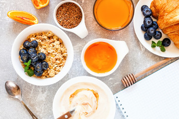Healthy breakfast - muesli with blueberry and honey