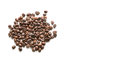 Heap of coffee beans on white background