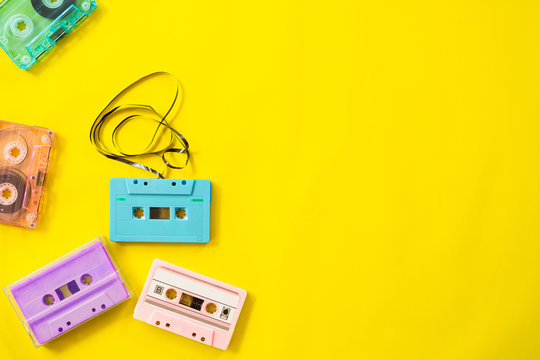 Retro Cassette Tape Recorder On Yellow Background, Flat Lay, Top View. Retro Technology