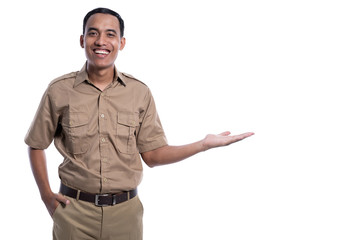 indonesian worker with khaki uniform presenting to blank copy space smiling isolated over white...