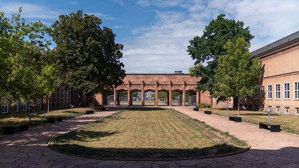 outside view of an art deco building with a beautiful passage in Leipzig on a sunny day, germany