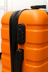 Orange travel suitcase